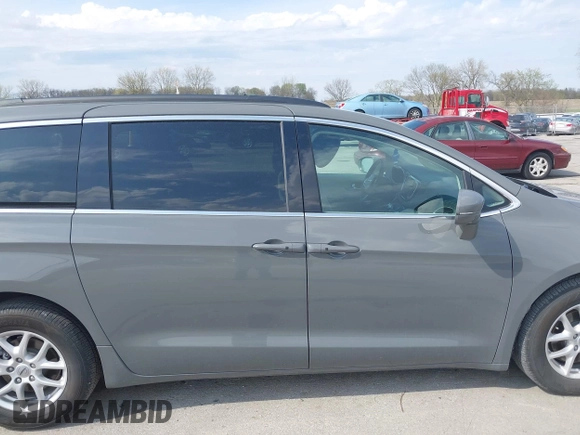 2022 Chrysler Pacifica Touring L z VIN 2C4RC1BG1NR150162, wystawiony jako IAAI lot #42125636 z przebiegiem 41 986 mil mil oraz . Historia ofert i sprzedaży dostępna na DreamBid. Obrazek 14.