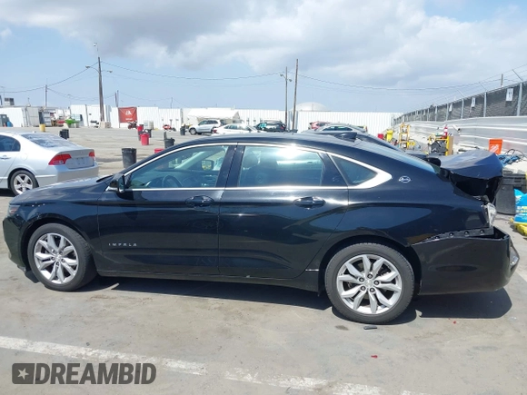 2018 Chevrolet Impala LT z VIN 2G1105S30J9170545, wystawiony jako IAAI lot #41901062 z przebiegiem 103 415 mil mil oraz . Historia ofert i sprzedaży dostępna na DreamBid. Obrazek 14.