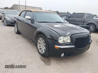 2008 Chrysler 300 C Hemi with VIN 2C3KA63H18H140449, listed as a IAAI auction lot 41574095 with 129,902 mi miles. Bid and sale history available at carsss.com. Image 1.