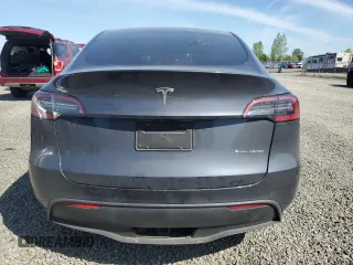 2022 Tesla Model Y Long Range z VIN 7SAYGDEE5NF367885, wystawiony jako Copart lot #52944795 z przebiegiem Nie podano mil oraz Szkoda całkowita • Salvage title. Historia ofert i sprzedaży dostępna na DreamBid. Obrazek 6.