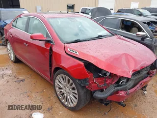 2014 Buick LaCrosse Premium II with VIN 1G4GF5G3XEF273604, listed as a IAAI auction lot 42252108 with 154,257 mi miles and . Bid and sale history available at DreamBid. Image 1.