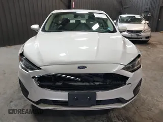 2020 Ford Fusion SE z VIN 3FA6P0LU8LR142370, wystawiony jako IAAI lot #42457342 z przebiegiem 53 808 mil mil oraz . Historia ofert i sprzedaży dostępna na DreamBid. Obrazek 12.
