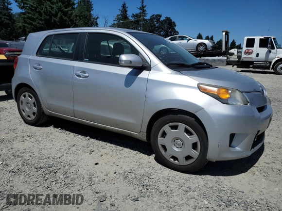 2013 Scion xD with VIN JTKKUPB43D1032634, listed as a Copart auction lot 64793465 with 74,065 mi miles and Salvage title. Bid and sale history available at DreamBid. Image 4.