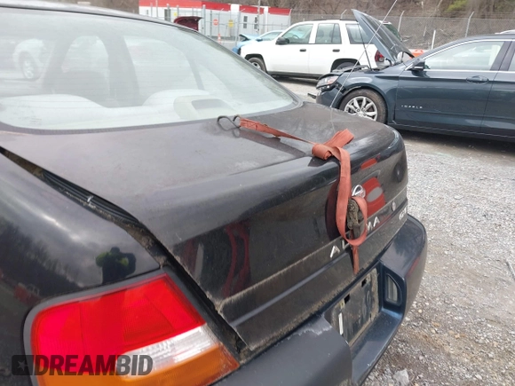 1999 Nissan Altima XE with VIN 1N4DL01DXXC148729, listed as a IAAI auction lot 41697641 with 187,596 mi miles. Bid and sale history available at carsss.com. Image 6.