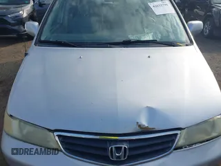 2003 Honda Odyssey EX-L with VIN 5FNRL18913B061340, listed as a IAAI auction lot 42633790 with 1,281,195 mi miles and . Bid and sale history available at DreamBid. Image 10.