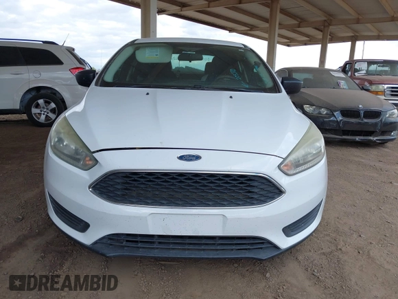 2018 Ford Focus S with VIN 1FADP3E26JL205370, listed as a IAAI auction lot 42083989 with 91,401 mi miles and . Bid and sale history available at DreamBid. Image 6.
