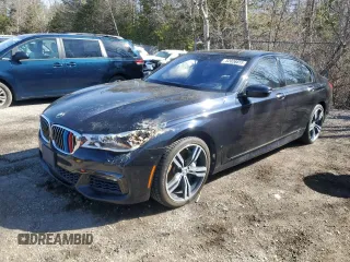 2017 BMW 7 Series 750i xDrive with VIN WBA7B0C55HG527032, listed as a Copart auction lot 52026415 with 67,722 mi miles and Clean title. Bid and sale history available at DreamBid. Image 1.