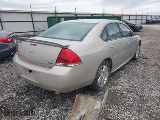 2012 Chevrolet Impala LT Retail with VIN 2G1WB5E38C1139881, listed as a IAAI auction lot 41922693 with 121,887 mi miles. Bid and sale history available at carsss.com. Image 4.