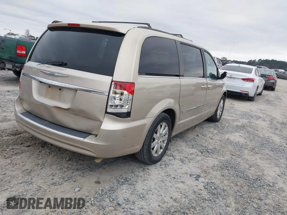 2016 Chrysler Town & Country Touring with VIN 2C4RC1BG1GR205535, listed as a IAAI auction lot 41183078 with 99,968 mi miles and . Bid and sale history available at DreamBid. Image 4.