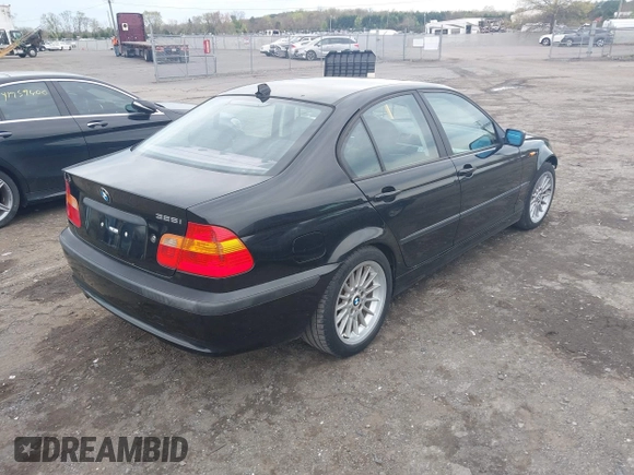 2005 BMW 3 Series 325i with VIN WBAET37435NH06607, listed as a IAAI auction lot 41974725 with 195,378 mi miles. Bid and sale history available at carsss.com. Image 4.