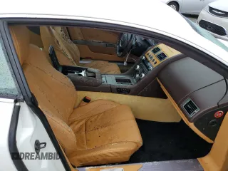 2011 Aston Martin DB9 z VIN SCFFDAAE8BGA13186, wystawiony jako Copart lot #74703544 z przebiegiem Nie podano mil oraz Szkody całkowita. Historia ofert i sprzedaży dostępna na DreamBid. Obrazek 10.