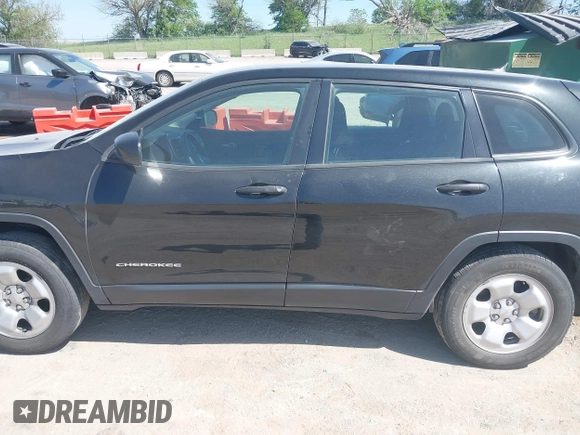 2015 Jeep Cherokee Sport z VIN 1C4PJMAB5FW533924, wystawiony jako IAAI lot #42245990 z przebiegiem 202 480 mil mil oraz . Historia ofert i sprzedaży dostępna na DreamBid. Obrazek 14.