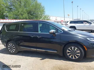 2023 Chrysler Pacifica Hybrid Limited with VIN 2C4RC1S73PR588684, listed as a IAAI auction lot 42009317 with 45,372 mi miles. Bid and sale history available at carsss.com. Image 14.