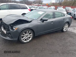 2014 Mazda Mazda6 i Touring with VIN JM1GJ1V6XE1138483, listed as a IAAI auction lot 41956426 with 91,294 mi miles. Bid and sale history available at carsss.com. Image 18.