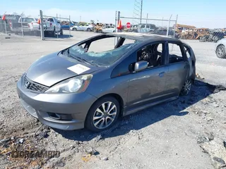 2013 Honda Fit Sport with VIN JHMGE8H52DC080175, listed as a IAAI auction lot 41769302 with 1 mi miles. Bid and sale history available at carsss.com. Image 2.