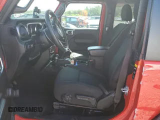 2021 Jeep Wrangler Sport with VIN 1C4GJXAG7MW801107, listed as a Copart auction lot 67925804 with 32,740 mi miles and Salvage Title. Bid and sale history available at DreamBid. Image 7.