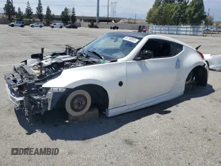2012 Nissan 370Z z VIN JN1AZ4EH1CM562134, wystawiony jako Copart lot #56708065 z przebiegiem Nie podano mil oraz Szkody całkowita. Historia ofert i sprzedaży dostępna na DreamBid. Obrazek 1.