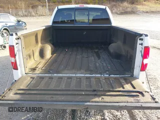 2005 Ford F-150 STX with VIN 1FTRX14W15NB34372, listed as a IAAI auction lot 41660412 with 104,086 mi miles. Bid and sale history available at carsss.com. Image 8.