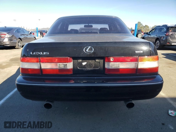 1994 Lexus LS z VIN JT8UF11E7R0212423, wystawiony jako Copart lot #41617785 z przebiegiem 228 574 mil mil oraz Szkoda całkowita • Salvage title. Historia ofert i sprzedaży dostępna na DreamBid. Obrazek 6.