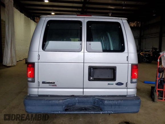 2011 Ford Econoline Cargo Commercial with VIN 1FTNE1EW6BDB02070, listed as a Copart auction lot 58601985 with 58,381 mi miles and Salvage title. Bid and sale history available at DreamBid. Image 6.