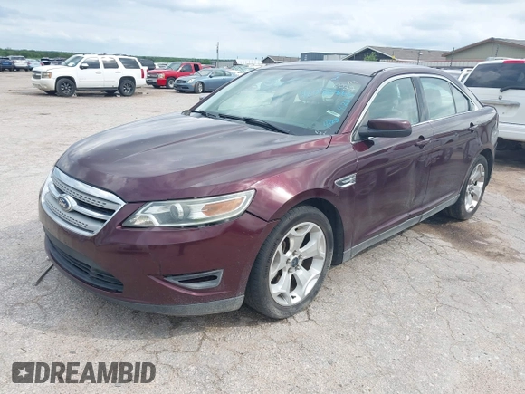 2011 Ford Taurus SEL with VIN 1FAHP2EW6BG120022, listed as a IAAI auction lot 42086866 with 271,643 mi miles. Bid and sale history available at carsss.com. Image 2.