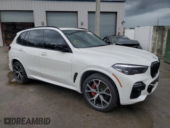 2021 BMW X5 sDrive40i with VIN 5UXCR4C01M9H47230, listed as a Copart auction lot 59798464 with 36,975 mi miles and Salvage title. Bid and sale history available at DreamBid. Image 4.