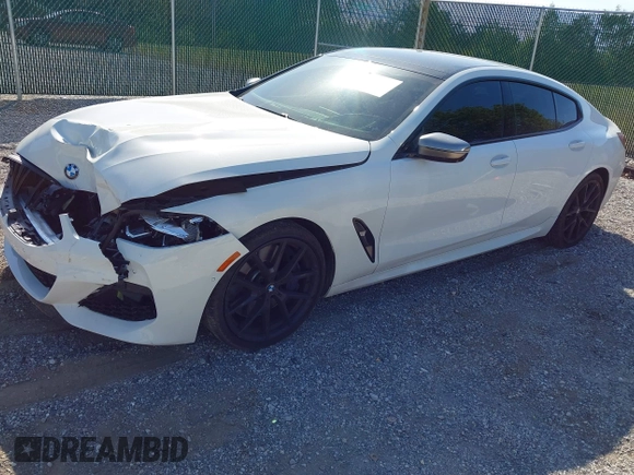 2022 BMW 8 Series M850i with VIN WBAGV8C09NCH15245, listed as a IAAI auction lot 42053154 with 26,384 mi miles and . Bid and sale history available at DreamBid. Image 2.
