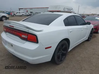 2014 Dodge Charger SXT with VIN 2C3CDXHG1EH122157, listed as a IAAI auction lot 41693517 with 191,095 mi miles and . Bid and sale history available at carsss.com. Image 4.
