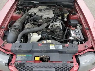 2001 Ford Mustang Deluxe с VIN 1FAFP444X1F234869, выставлен на аукционе Copart как лот 57380035 с пробегом 84 074 миль миль и Списание • Salvage title. История ставок и продаж доступна на DreamBid. Изображение 11.