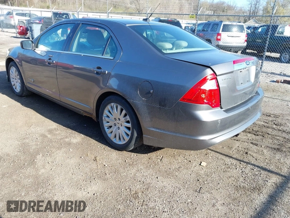 2010 Ford Fusion Hybrid z VIN 3FADP0L35AR423330, wystawiony jako IAAI lot #41972619 z przebiegiem 154 026 mil mil oraz . Historia ofert i sprzedaży dostępna na DreamBid. Obrazek 3.