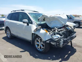 2015 Subaru Forester Touring with VIN JF2SJAWC8FH588321, listed as a IAAI auction lot 42689364 with 103,642 mi miles and . Bid and sale history available at DreamBid. Image 6.