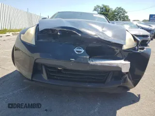 2009 Nissan 370Z Touring with VIN JN1AZ44EX9M407369, listed as a Copart auction lot 66755474 with 124,031 mi miles and Salvage Title. Bid and sale history available at carsss.com. Image 5.