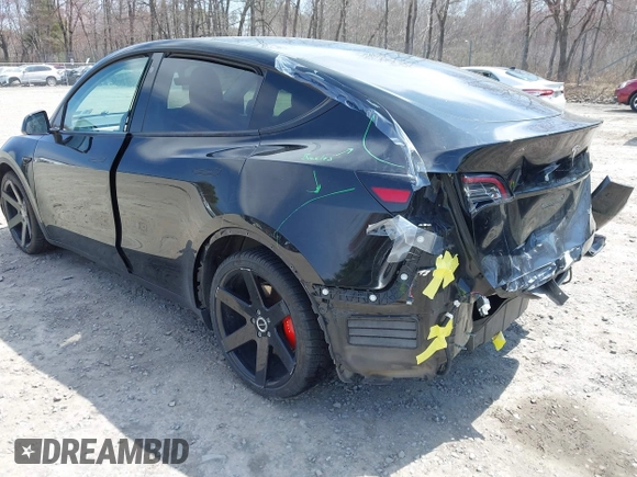 2022 Tesla Model Y Performance with VIN 7SAYGDEF7NF310113, listed as a IAAI auction lot 42038407 with 46,052 mi miles and . Bid and sale history available at DreamBid. Image 3.
