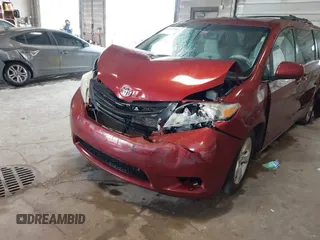 2012 Toyota Sienna LE AAS with VIN 5TDKK3DC5CS277303, listed as a IAAI auction lot 42162586 with 128,656 mi miles and . Bid and sale history available at DreamBid. Image 6.