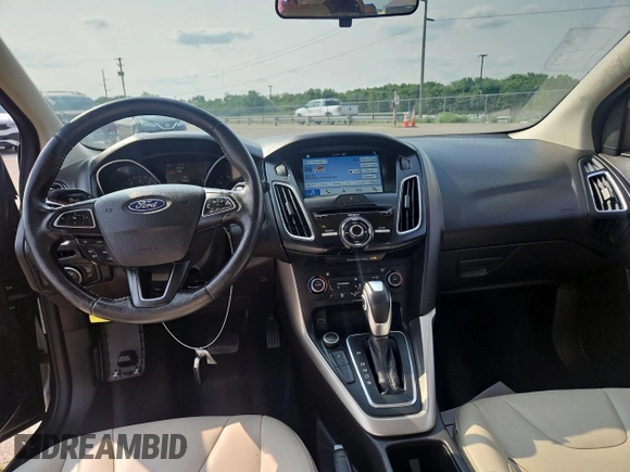 2017 Ford Focus Titanium with VIN 1FADP3N22HL279489, listed as a Copart auction lot 60740945 with 111,654 mi miles and Clean title. Bid and sale history available at DreamBid. Image 9.