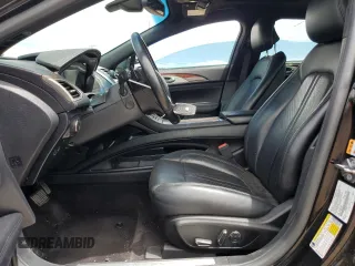 2017 Lincoln MKZ Reserve z VIN 3LN6L5EC6HR643638, wystawiony jako Copart lot #56601365 z przebiegiem 75 446 mil mil oraz Szkoda całkowita • Salvage title. Historia ofert i sprzedaży dostępna na DreamBid. Obrazek 7.