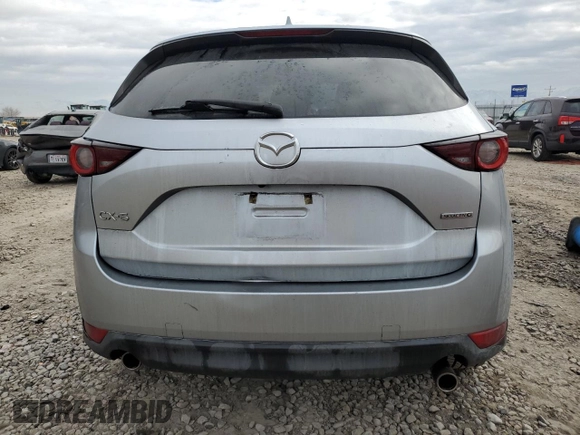 2021 Mazda CX-5 Touring with VIN JM3KFACM9M0409414, listed as a Copart auction lot 89071495 with 43,896 mi miles and Salvage Title. Bid and sale history available at carsss.com. Image 6.
