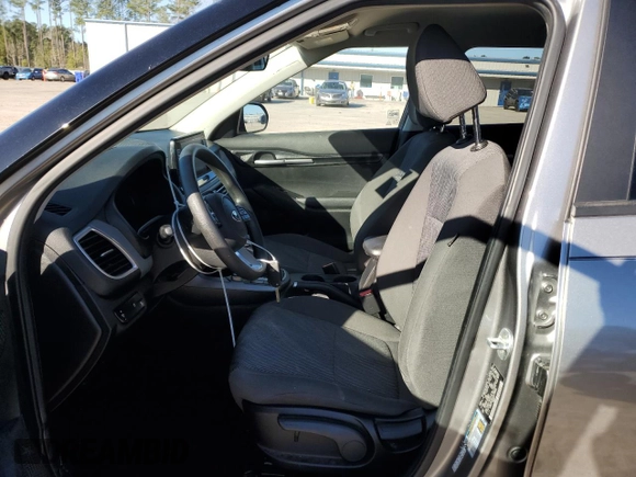 2021 Kia Seltos LX with VIN KNDEPCAA5M7178185, listed as a Copart auction lot 87043154 with 34,279 mi miles and Salvage Title. Bid and sale history available at DreamBid. Image 7.