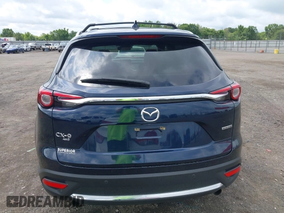 2020 Mazda CX-9 Grand Touring with VIN JM3TCBDY1L0402718, listed as a IAAI auction lot 42355511 with 87,205 mi miles and . Bid and sale history available at DreamBid. Image 16.