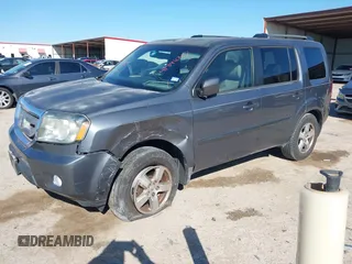 2011 Honda Pilot EX-L with VIN 5FNYF3H64BB056071, listed as a IAAI auction lot 41841047 with 112,114 mi miles and . Bid and sale history available at carsss.com. Image 2.