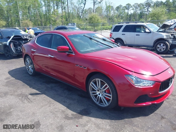 2015 Maserati Ghibli with VIN ZAM57XSA5F1129883, listed as a IAAI auction lot 41920750 with 63,739 mi miles. Bid and sale history available at carsss.com. Image 1.