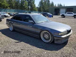 2001 BMW 7 Series 740iL with VIN WBAGH83401DP20569, listed as a Copart auction lot 52725335 with 152,575 mi miles and Salvage Title. Bid and sale history available at carsss.com. Image 4.