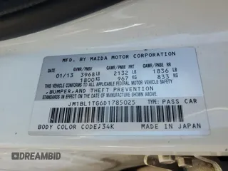 2013 Mazda 3 i SV with VIN JM1BL1TG6D1785025, listed as a Copart auction lot 56279915 with 134,544 mi miles and Salvage title. Bid and sale history available at DreamBid. Image 12.