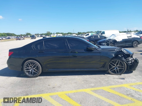 2016 BMW 7 Series 740i с VIN WBA7E2C51GG738889, выставлен на аукционе IAAI как лот 41838071 с пробегом 49 649 миль миль и . История ставок и продаж доступна на DreamBid. Изображение 13.