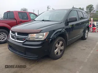 2014 Dodge Journey SE with VIN 3C4PDCAB0ET116863, listed as a IAAI auction lot 41950773 with 183,866 mi miles. Bid and sale history available at carsss.com. Image 2.