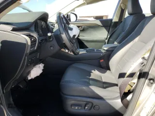 2021 Lexus NX 300 with VIN JTJGARBZ7M2191564, listed as a Copart auction lot 57974155 with 52,499 mi miles and Salvage title. Bid and sale history available at DreamBid. Image 7.