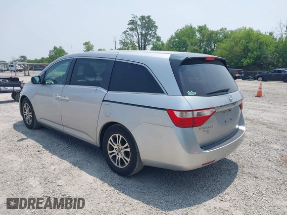 2012 Honda Odyssey EX z VIN 5FNRL5H44CB038825, wystawiony jako IAAI lot #42411401 z przebiegiem 214 164 mil mil oraz . Historia ofert i sprzedaży dostępna na DreamBid. Obrazek 3.