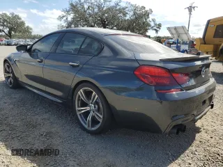 2015 BMW M6 z VIN WBS6C9C51FD467872, wystawiony jako Copart lot #79107574 z przebiegiem 79 139 mil mil oraz Szkoda całkowita • Salvage title. Historia ofert i sprzedaży dostępna na DreamBid. Obrazek 2.