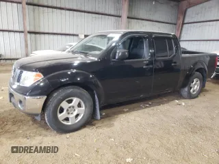 2007 Nissan Frontier SE z VIN 1N6AD09U27C409282, wystawiony jako Copart lot #89402925 z przebiegiem 115 746 mil mil oraz Szkoda całkowita • Salvage title. Historia ofert i sprzedaży dostępna na DreamBid. Obrazek 1.