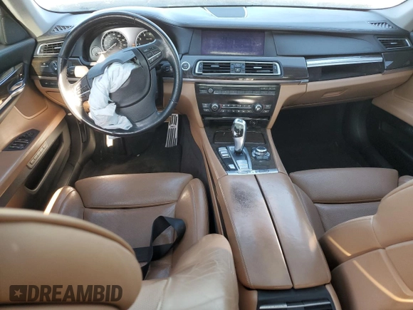 2011 BMW 7 Series 740i with VIN WBAKA4C51BC612629, listed as a Copart auction lot 77372234 with 164,471 mi miles and Salvage Title. Bid and sale history available at carsss.com. Image 8.